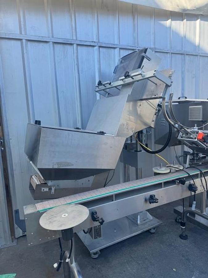 Used CVC 8-spindle Capper w/ Elevator & Conveyor