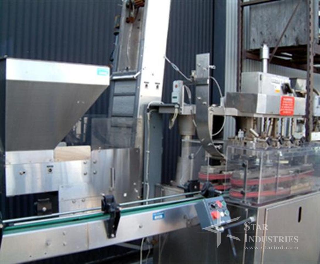 Used Unicap 8 spindle Capper