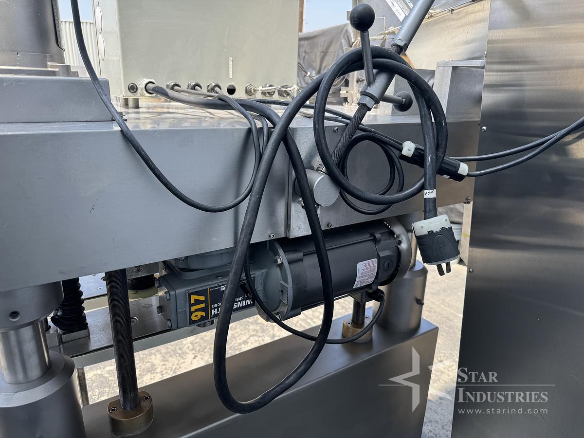 Used Six Spindle Capper with attached Cap Elevator
