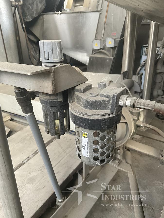 Used Twin 100 gallon S.S. Tanks w/ pumps on mezzanine