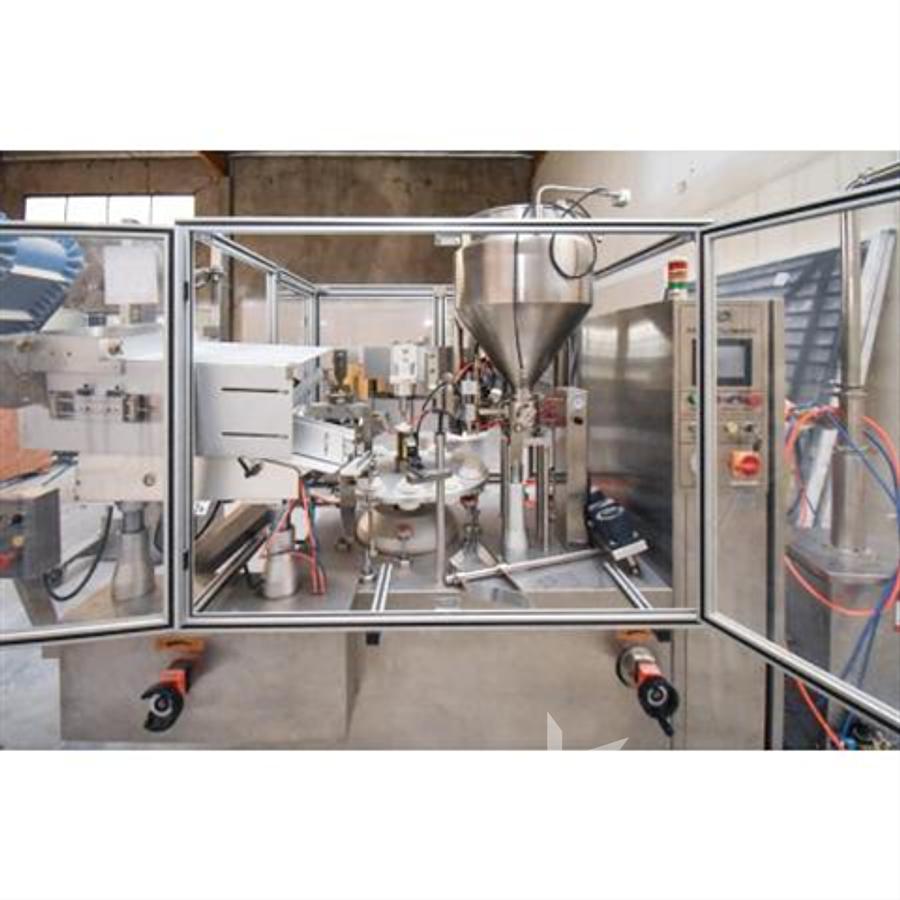 Used GF-400 Tube Filler/Sealer, rated 30-70 per minute