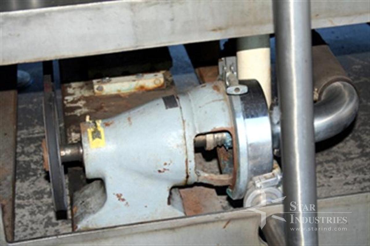 Used U.S. Rotary Gravity Filler, 18 heads for gallons