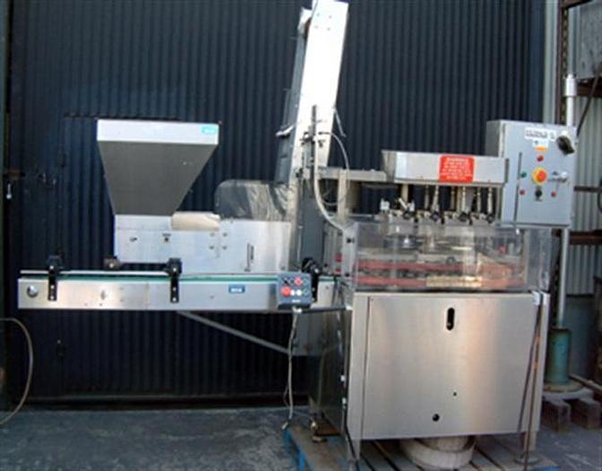Used Unicap 8 spindle Capper