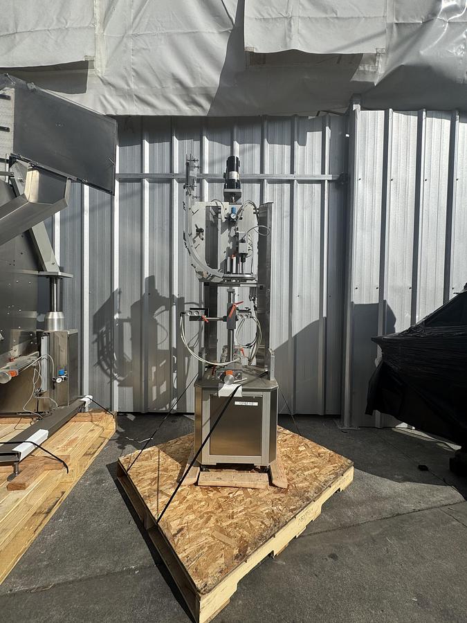 Used Chuck Capper w/ Elevator