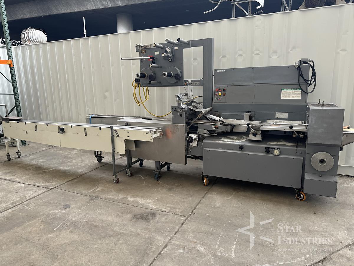 Used FMC Model WA-520 Flow-Wrapper w/ Conveyor