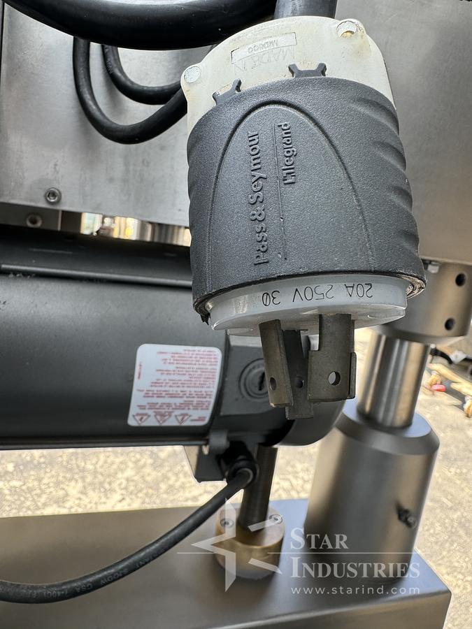 Used Six Spindle Capper with attached Cap Elevator
