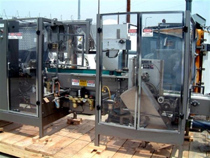 Used Roberts 450A tray packer w/ Nordson 3500V