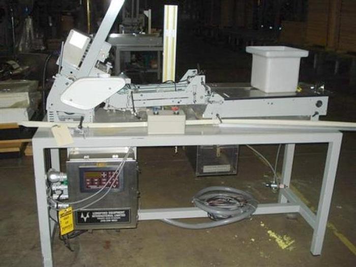 Used Longford Coupon Feeder, model C700-3-12FSM