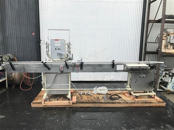 Used Filamatic Three Head Piston Filler With Conveyor