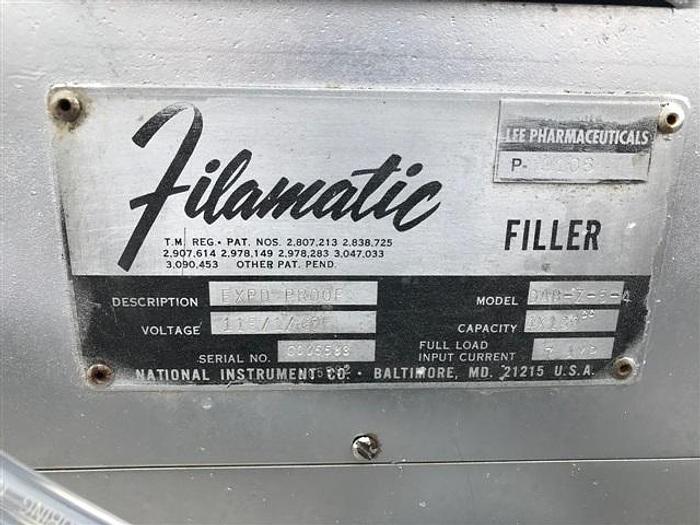 Used Filamatic Three Head Piston Filler With Conveyor