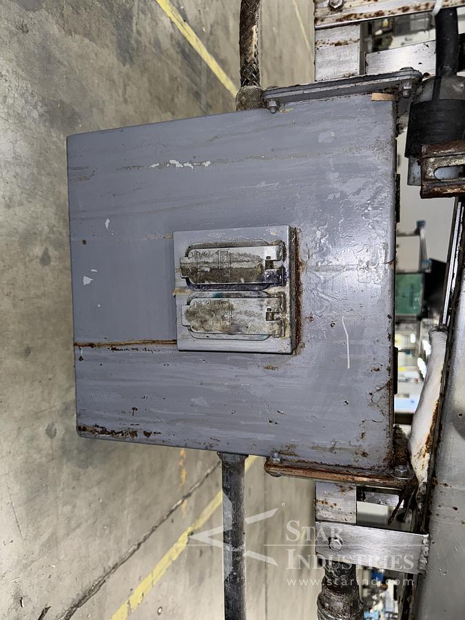 Used 6 Spindle Capper 