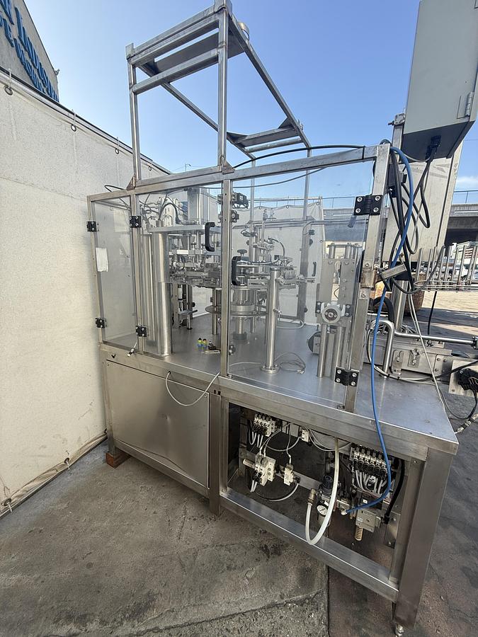 Used FILLER AND SEALER MACHINE
