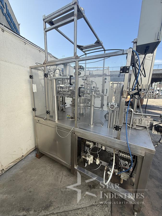 Used FILLER AND SEALER MACHINE