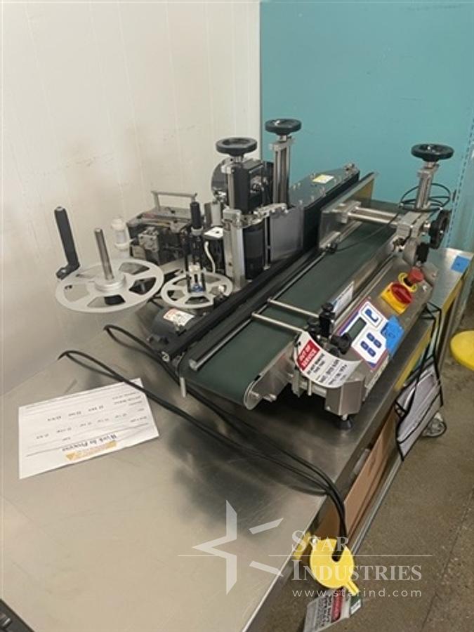 Used Pack Leader Model 50 Wrap-around Labeler w/ Norwood RS-1100 Top Labeler