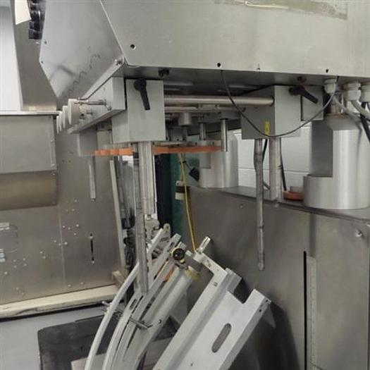 Used D.L.-Tech 8-spindle Capper