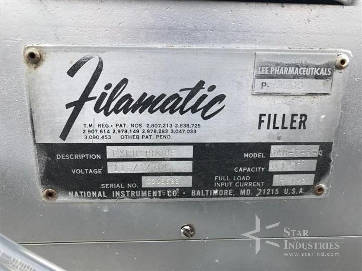 Used Filamatic Four Head Piston Filler With Conveyor