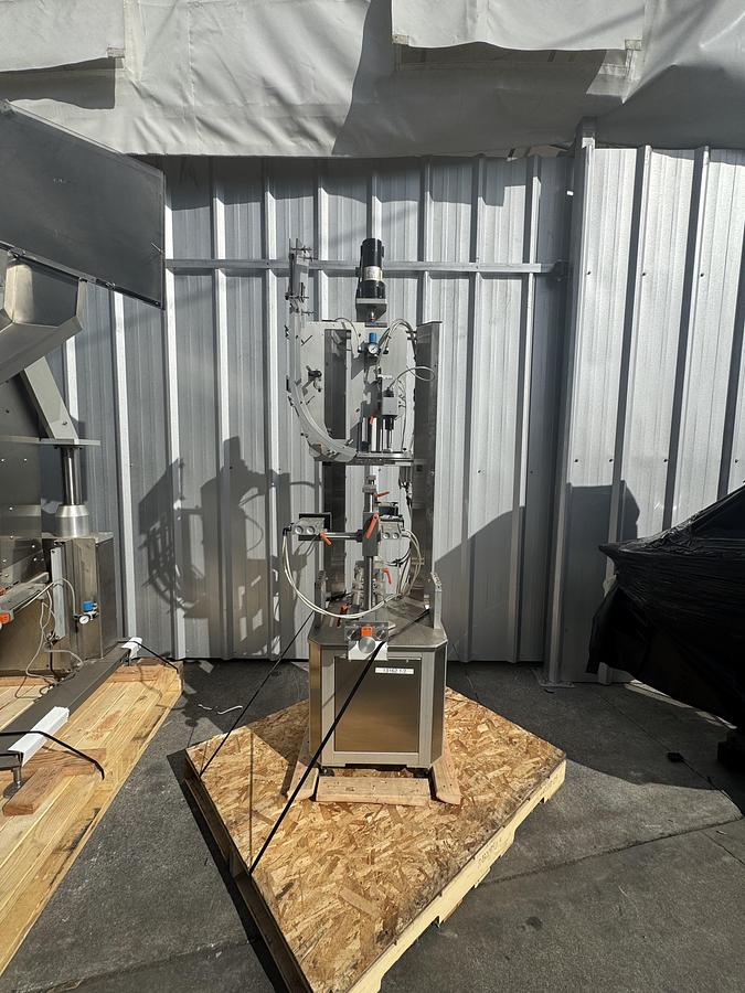 Used Chuck Capper w/ Elevator