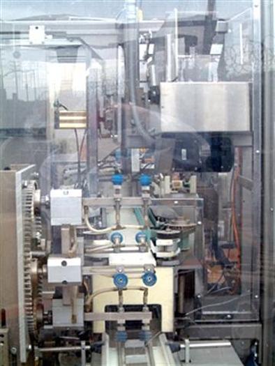 Used Roberts 450A Tray Packer w/ Nordson 2302