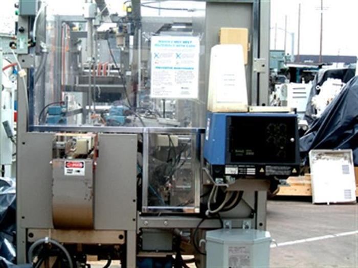 Used Roberts 450A Tray Packer w/ Nordson 2302