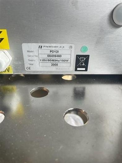 Used Flexicon PD12I Peristaltic Pump w/ MC12 Controller