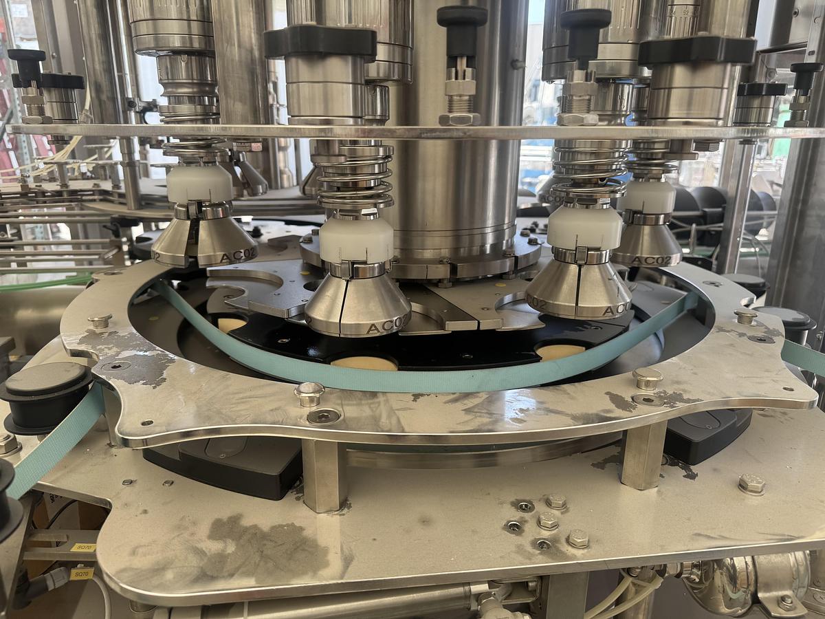 Used Arol Capper with Hopper and Elevator