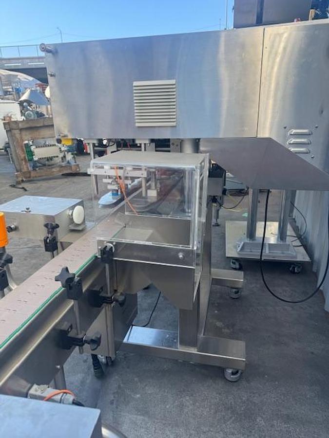 Used CVC 8-spindle Capper w/ Elevator & Conveyor