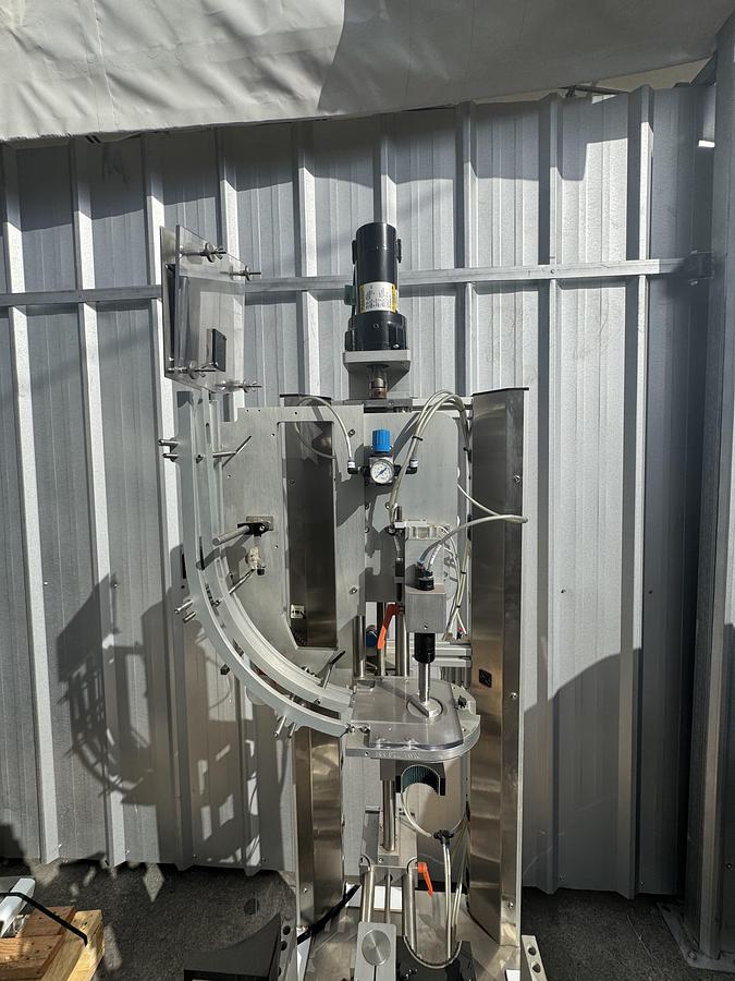 Used Chuck Capper w/ Elevator