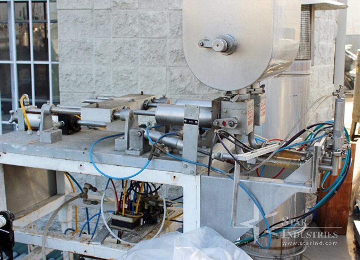 Used Simplex pneumatic 2-piston Filler
