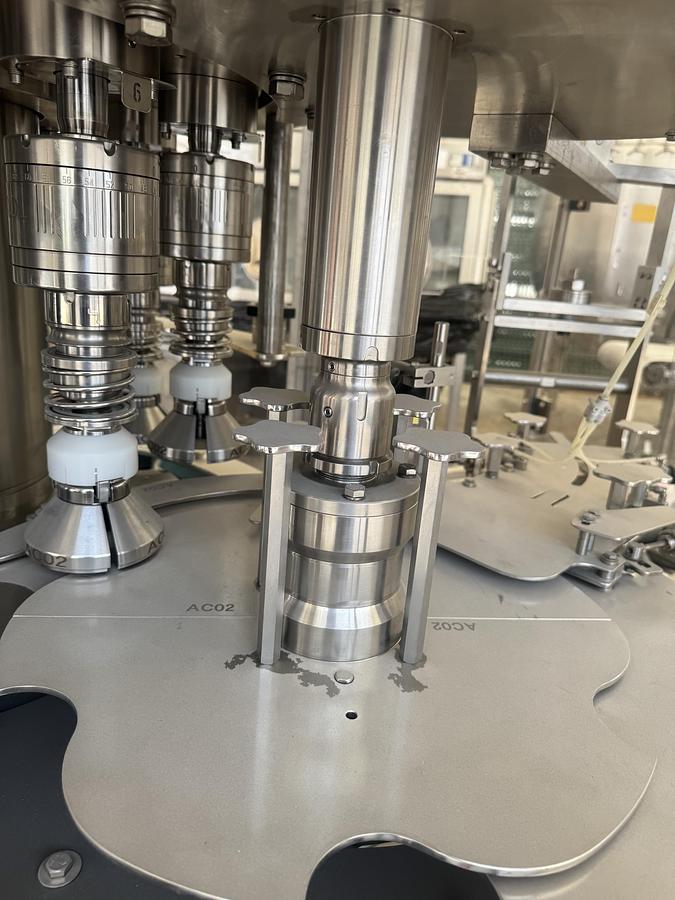 Used Arol Capper with Hopper and Elevator