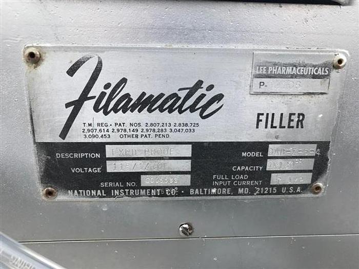 Used Filamatic Three Head Piston Filler With Conveyor