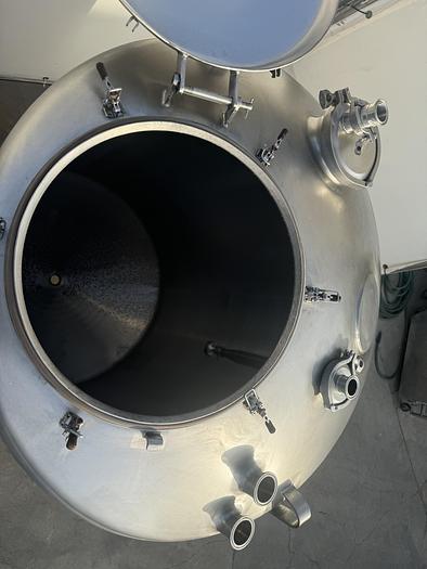 Used 1,000 gallon DCI s.s. Tank