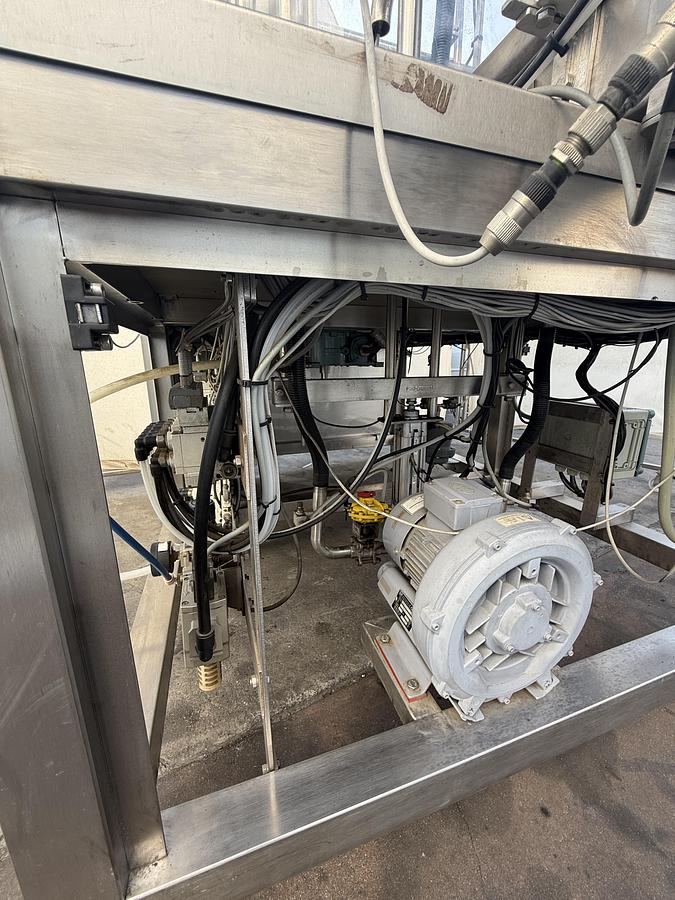 Used FILLER AND SEALER MACHINE