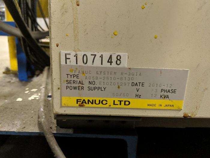 Used 2012 FANUC M710iC/50 6 AXIS ROBOT WITH IR VISION AND R30iA CONTROLLER.
