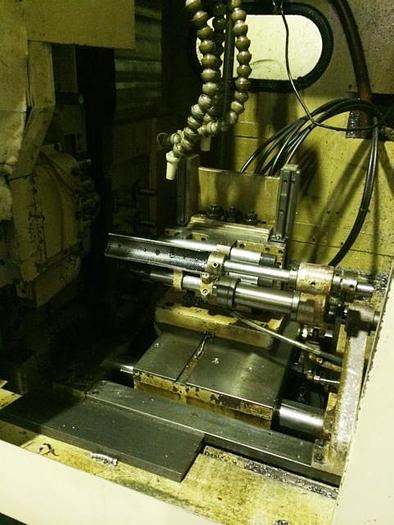 Used Nomura NN-25RYA Swiss Style CNC lathe
