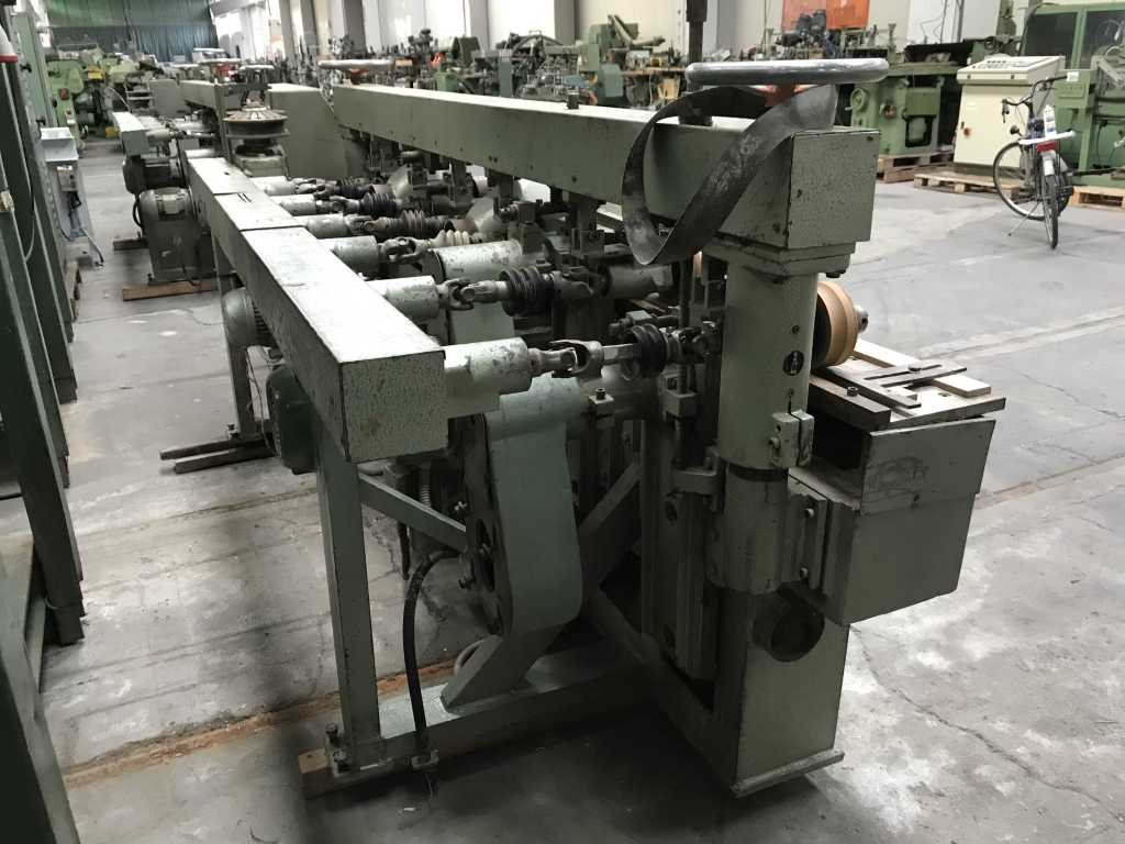 Usato Scorniciatrice marca Gubish attrezzata per pezzi tondi da 34,50mm (completa di utensili per altri diametri di pezzi tondi)