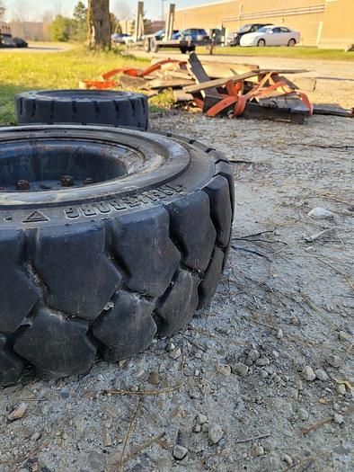 Trelleborg T-800 6.50-10 NHS Solid Cushion Equipment Tire 12 PR w/5 Bolt Rim