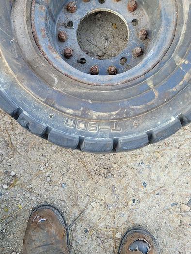 Trelleborg T-800 6.50-10 NHS Solid Cushion Equipment Tire 12 PR w/5 Bolt Rim