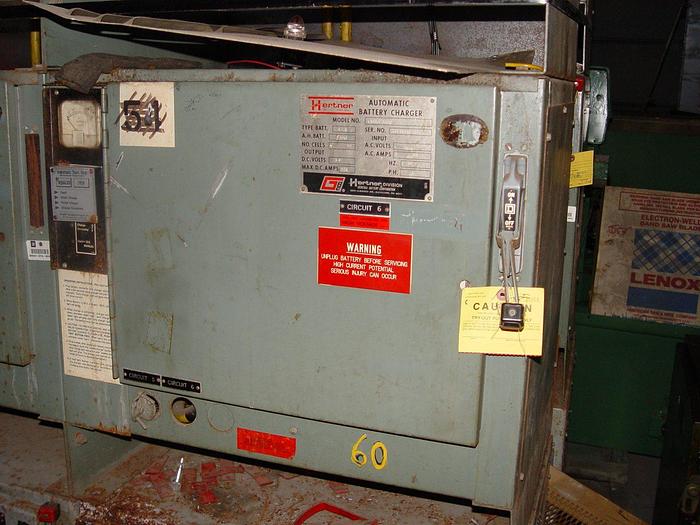 Used Bank of (9) Total Hertner 36V Battery Chargers Model #TAX18-1200