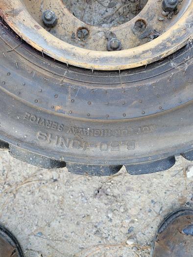 Used Titan 6.50-10 NHS PWT Premium Wide Trac Pneumatic Equipment Tire w/6 Bolt Rim