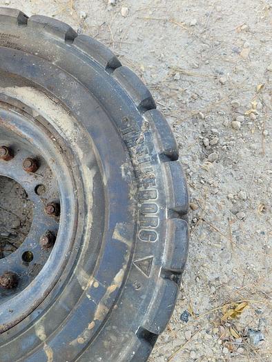 Trelleborg T-800 6.50-10 NHS Solid Cushion Equipment Tire 12 PR w/5 Bolt Rim