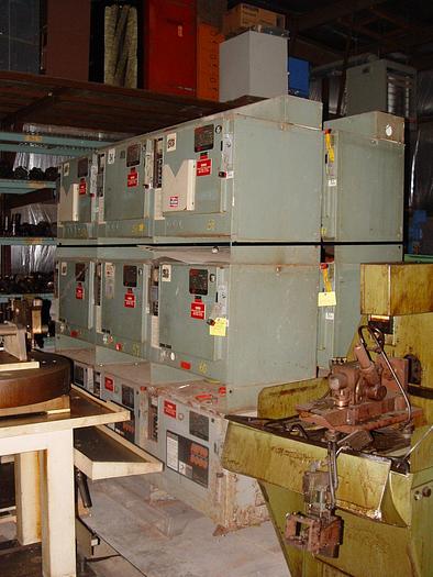 Used Bank of (9) Total Hertner 36V Battery Chargers Model #TAX18-1200