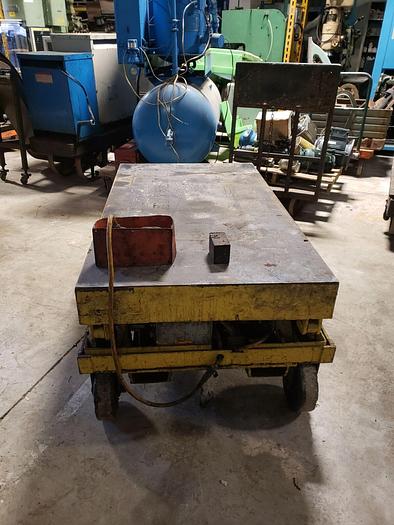 Used Large Yellow 6000# Scissor Lift on 4 Castors, 64” x 36” Platform