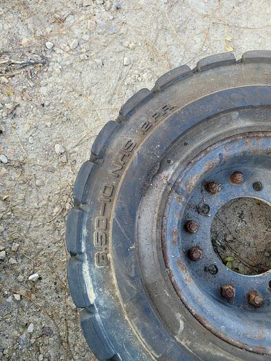 Trelleborg T-800 6.50-10 NHS Solid Cushion Equipment Tire 12 PR w/5 Bolt Rim