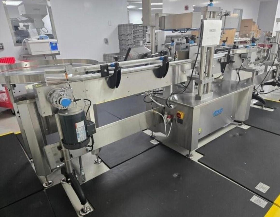 Used Used Aesus Automatic Stainless Steel Panel and Wrap Pressure Sensitive Labeler, Model Eco-Panel