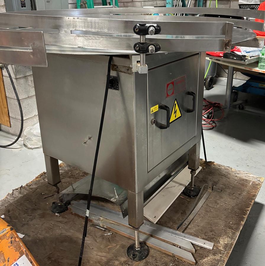 Used Used Capmatic 48” Stainless Steel Accumulating Table