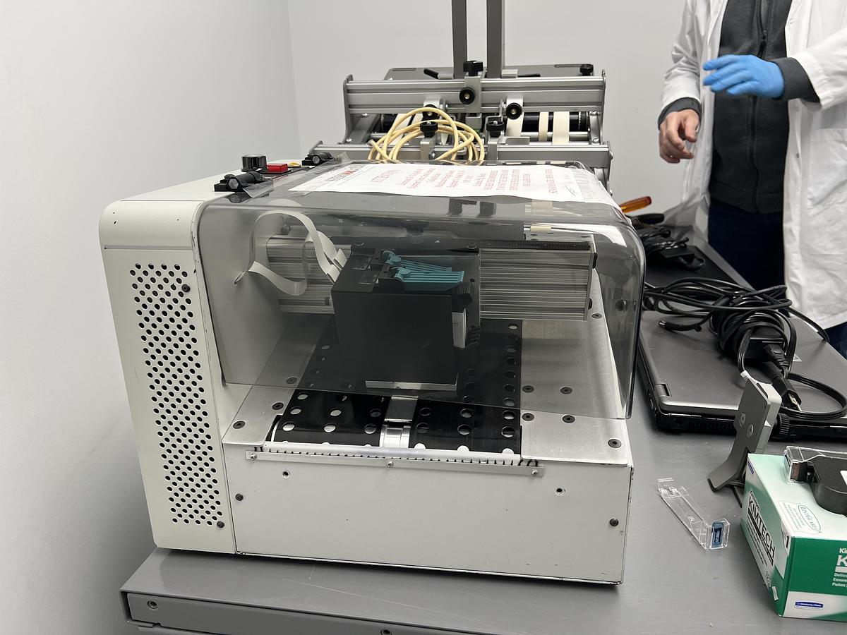 Used Used Straight Shooter Friction Feeder, Model R-14E with Accufast P4 Printer