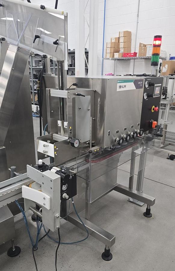 Used Used Promach - NJM Unicap 150 Automatic Stainless Steel 4 Quill Capper, Model UCAP-150-S170
