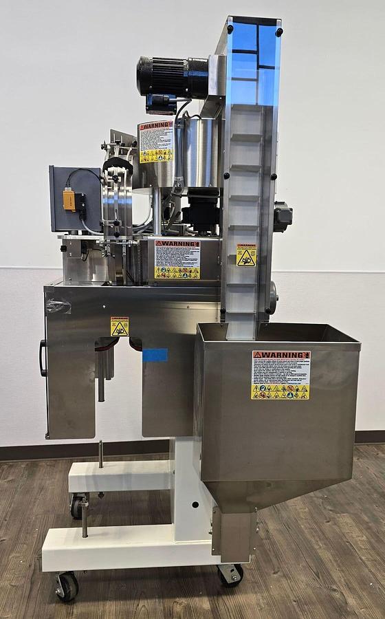 Used Used Kaps-All Automatic Inline 2 Quill Capper, Model E-4R