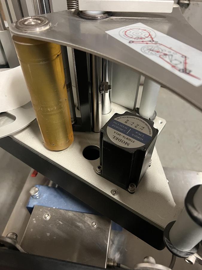 Used Used HealthCaps Automatic Pressure Sensitive Wraparound Labeler