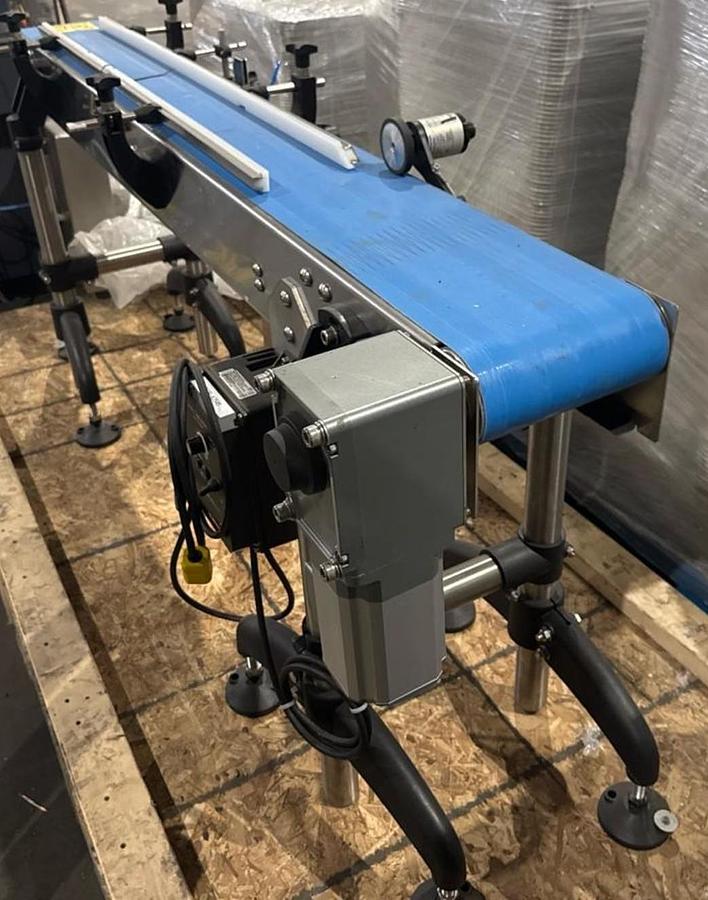 Used Used Stainless Steel 71” long x 8-1/2” wide motorized conveyor